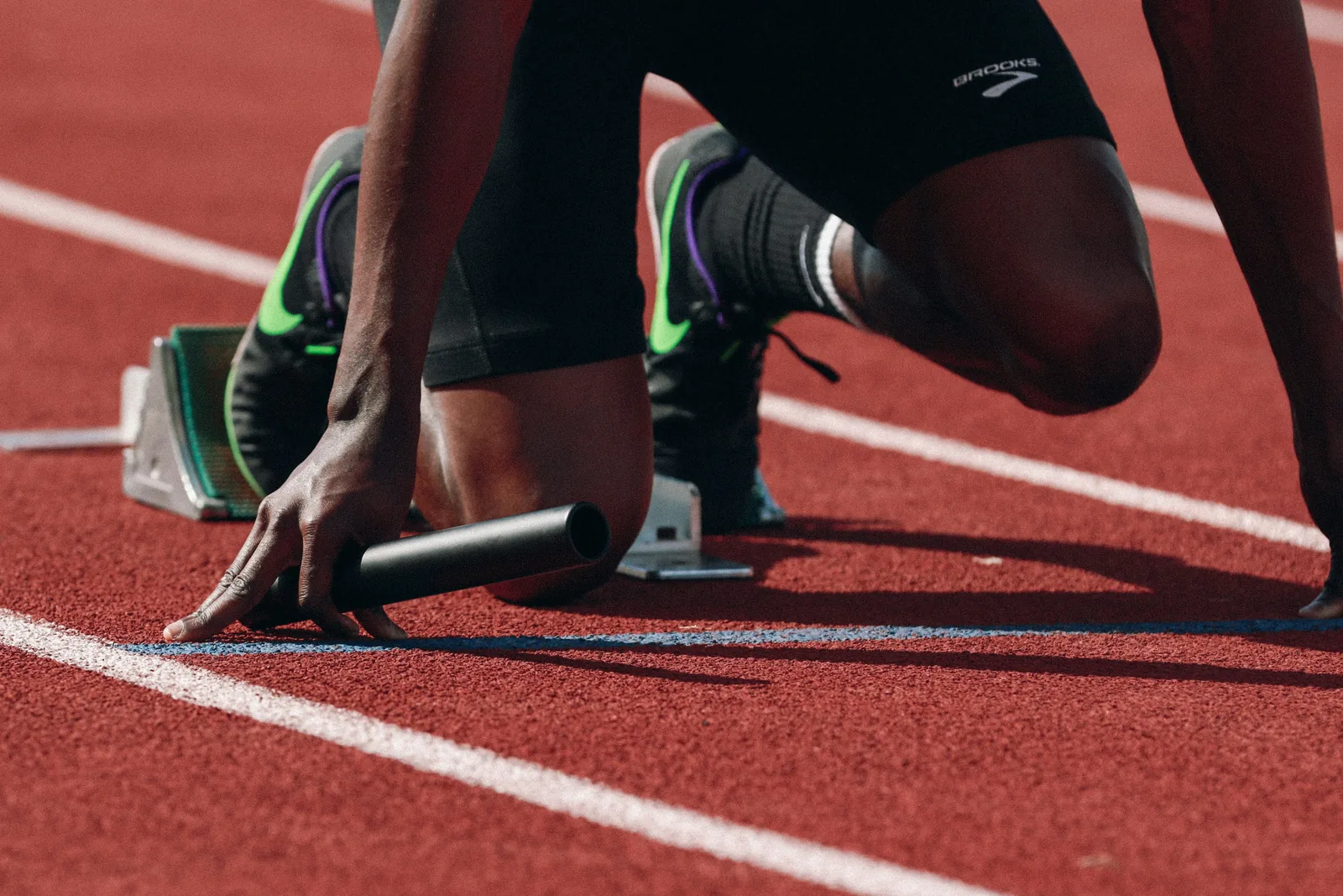 Sprinter exploding out of the starting blocks